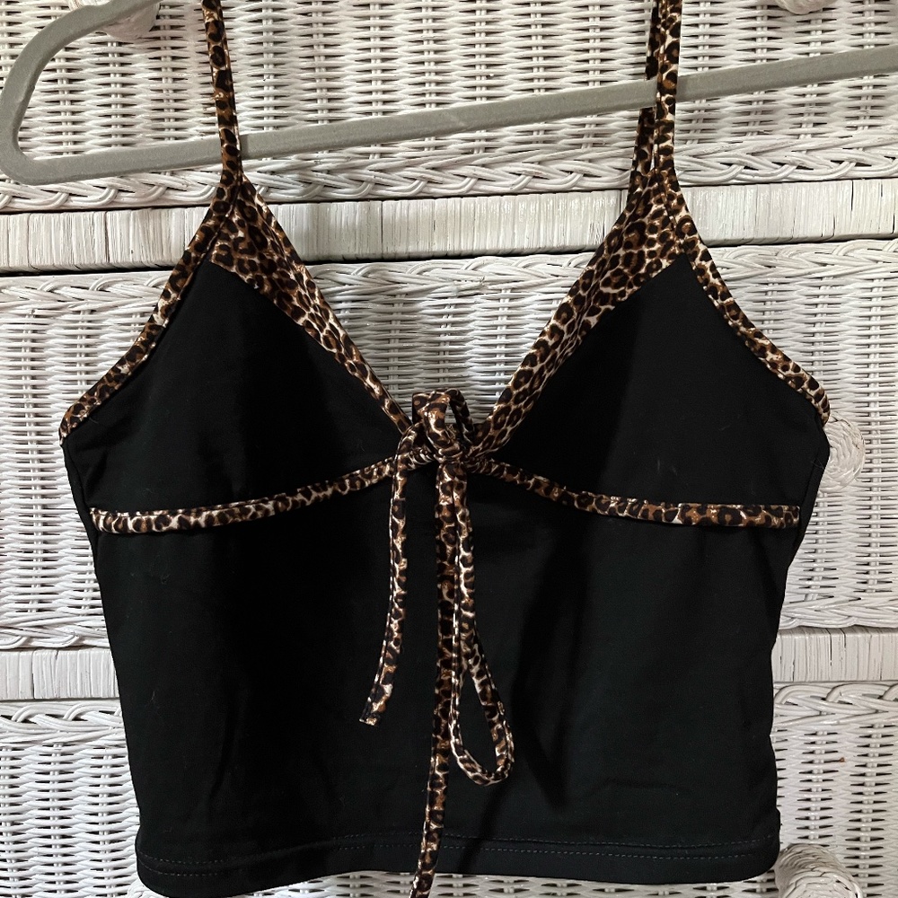 Black, cheetah lined tank top with tie in the front